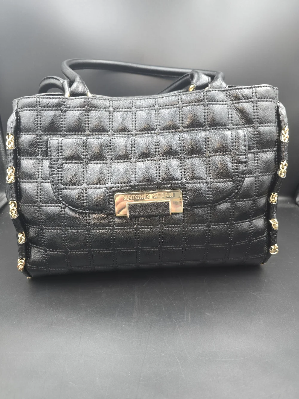 ANTONIO MELANI Black Quilted Top-Handle Satchel with Gold Accents